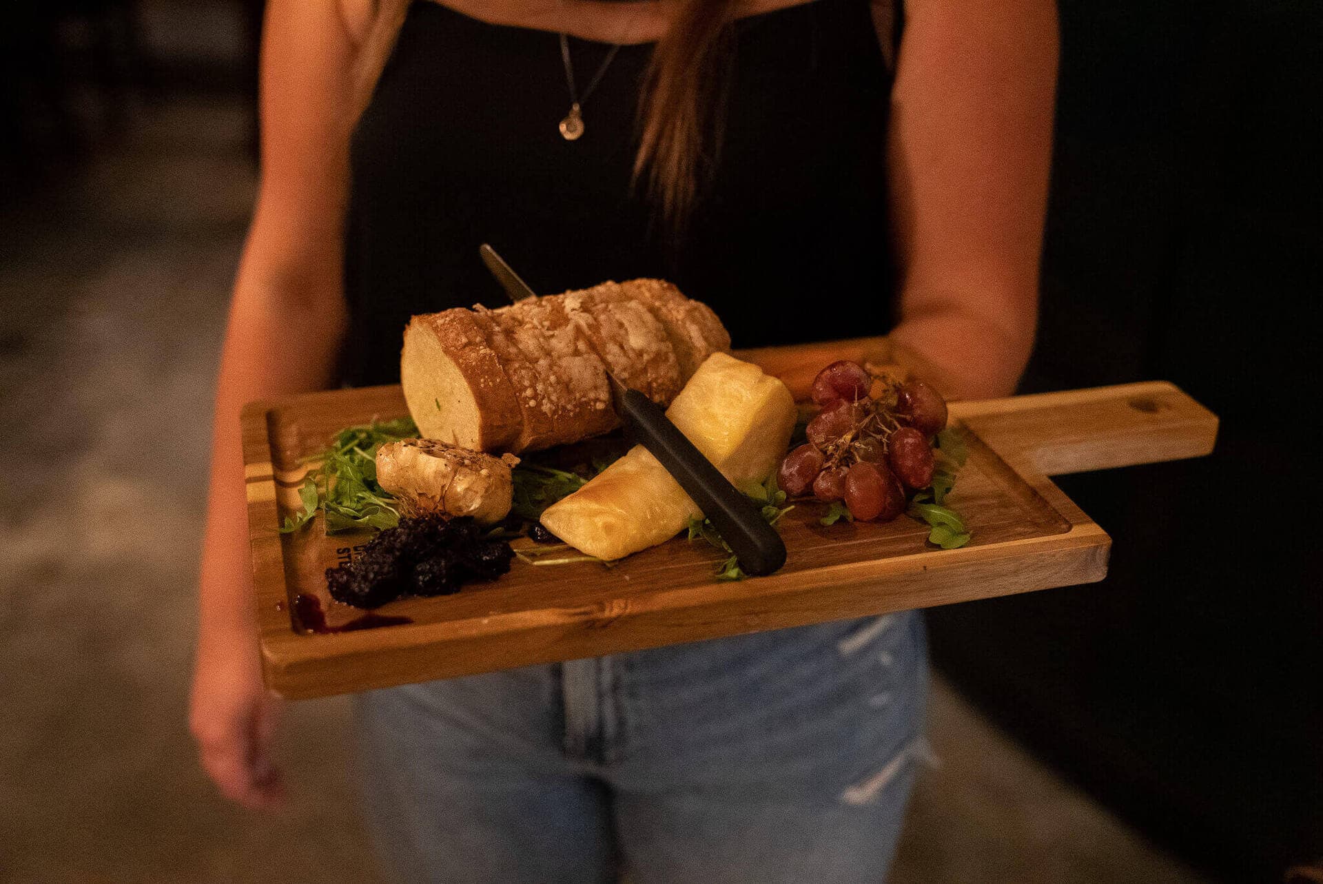 A charcuterie and cheese board served at Cenote